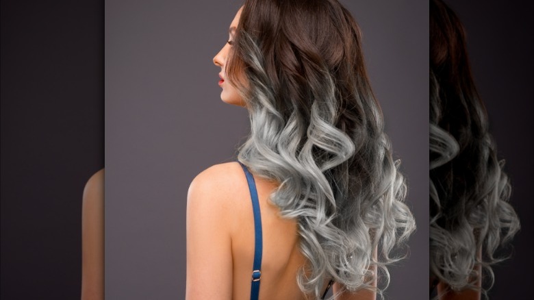 Woman with once-trendy ombre hair