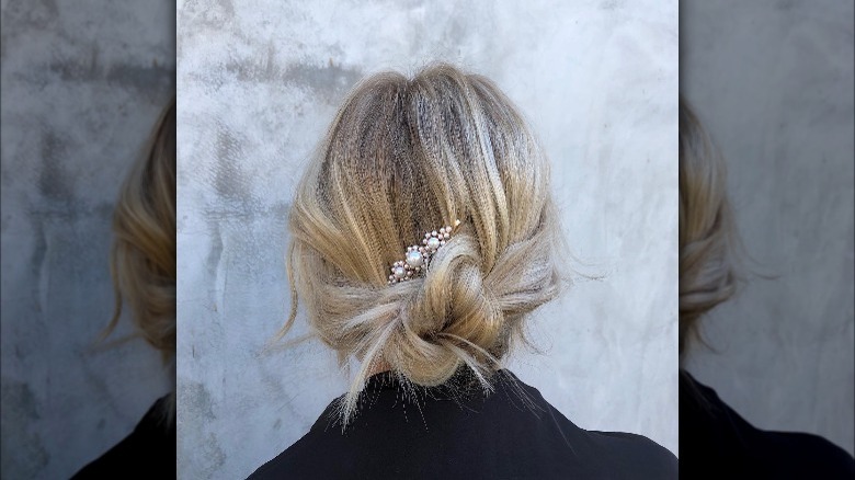 Girl with an easy knotted updo.