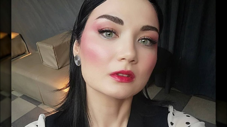 Woman wearing bright blush