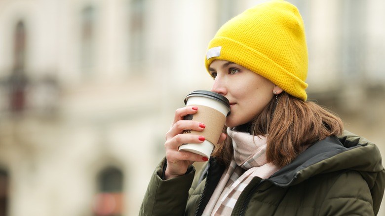 Woman in yellow beanie