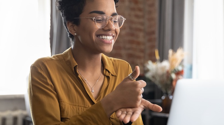 Woman working and smiling