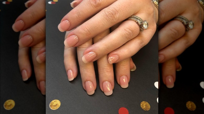 fingers with simple nail manicure