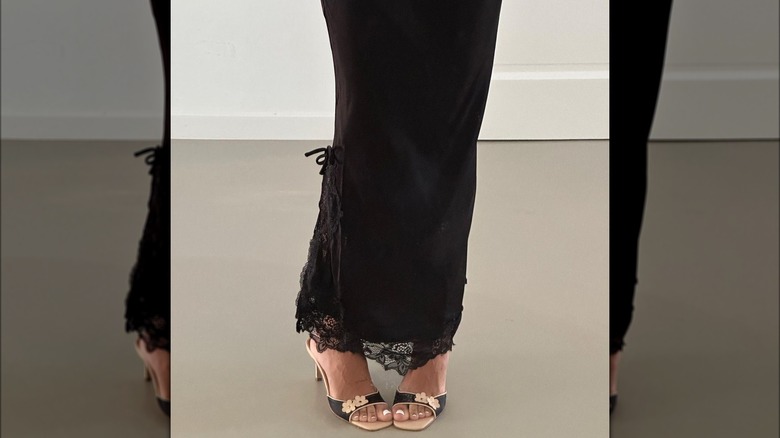 Black skirt, embellished heeled slides