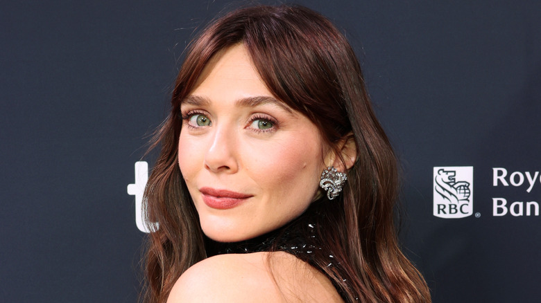 Elizabeth Olsen posing on the red carpet