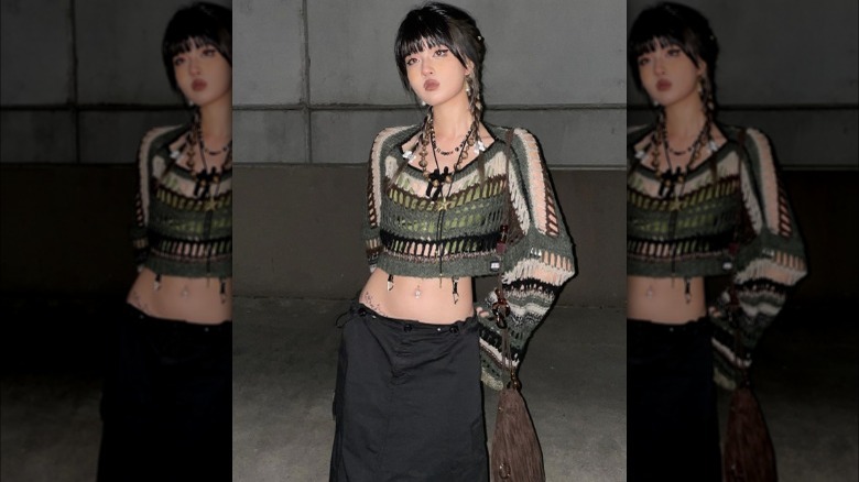 A woman wearing a lot of jewelry