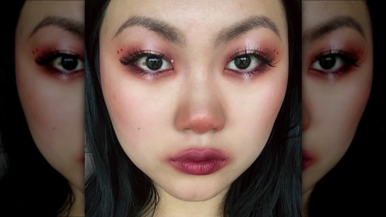 person with smudged lipstick