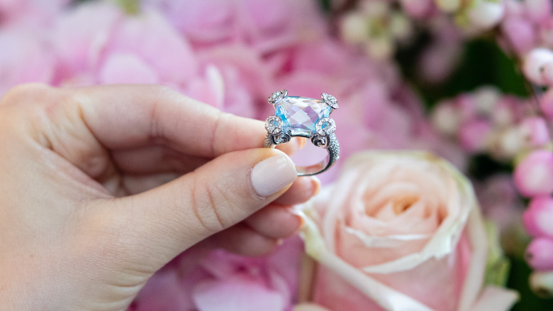 A diamond horsebit ring