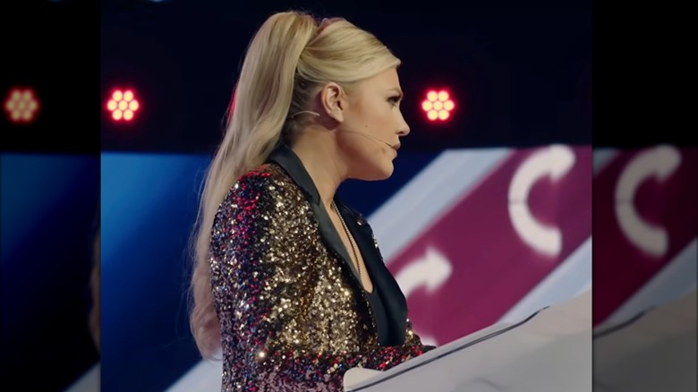 Erika Kirk gives a speech in front of a crowd