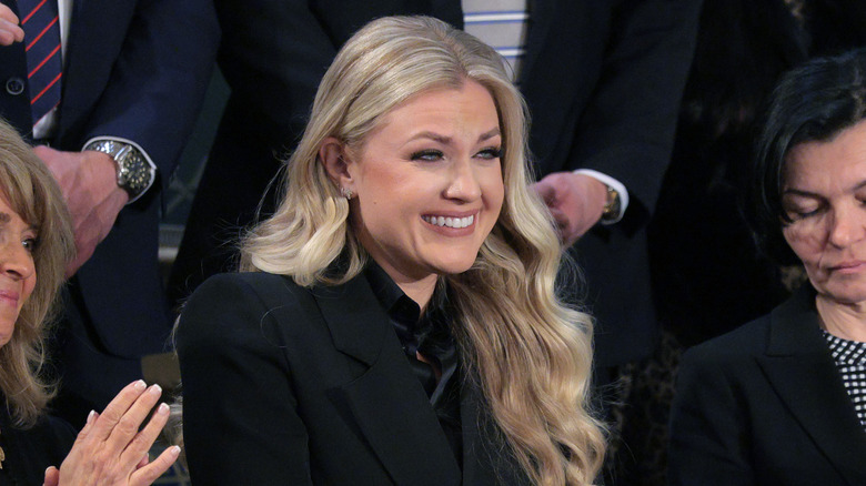 Erika Kirk in a black blazer and black blouse