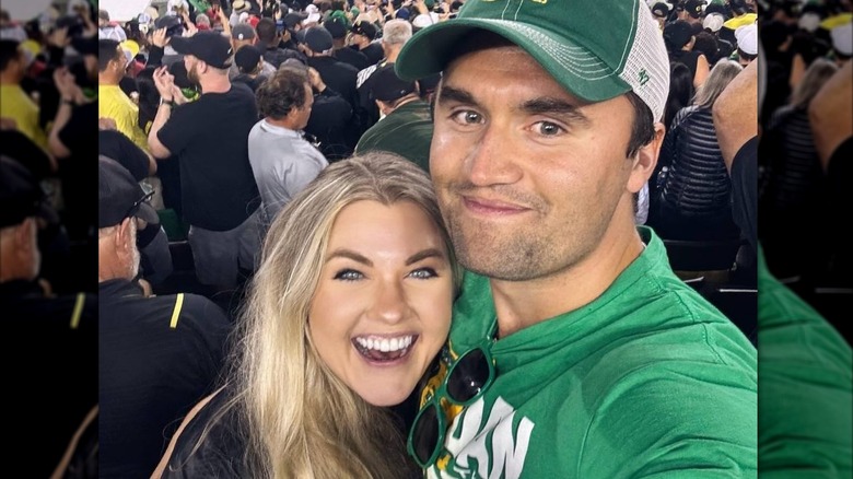 Erika and Charlie Kirk at a game