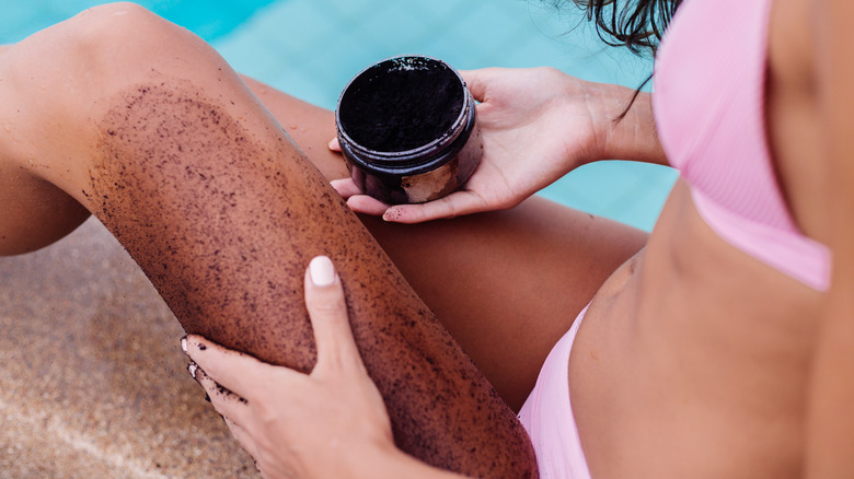 Woman using an exfoliant