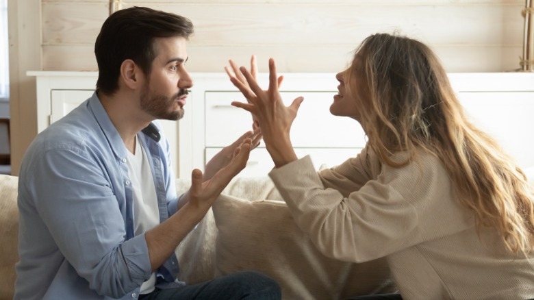 Man and woman yelling