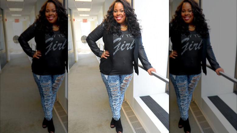 Woman wearing distressed wash jeans 