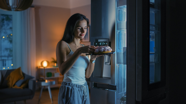 A woman eating cake