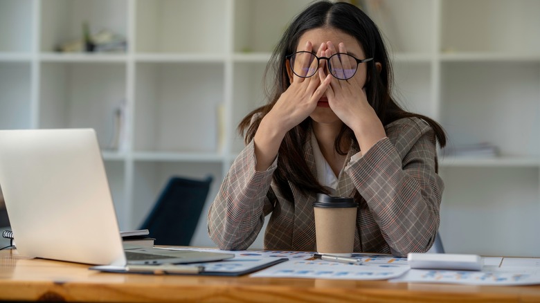 woman stressed at work