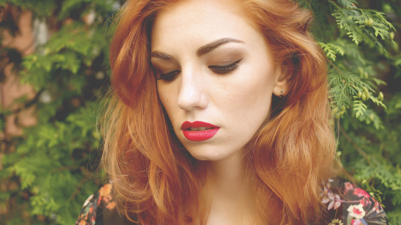 Red headed woman wearing matte eyeshadow