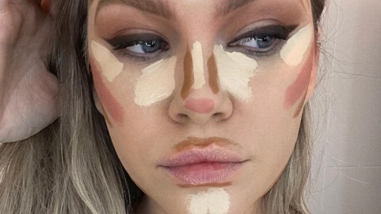 Woman wearing a lot of concealer