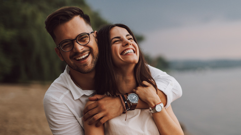 Couple embracing on the beach 