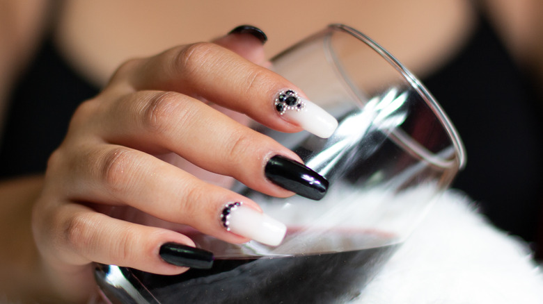 Showing off long polygel nails