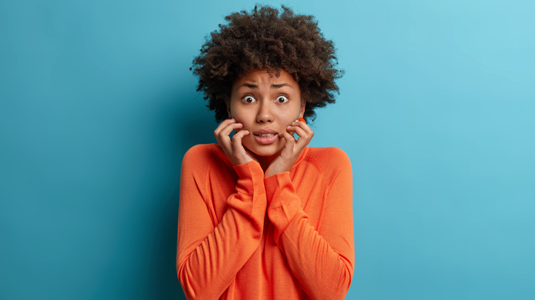 Woman looking nervous