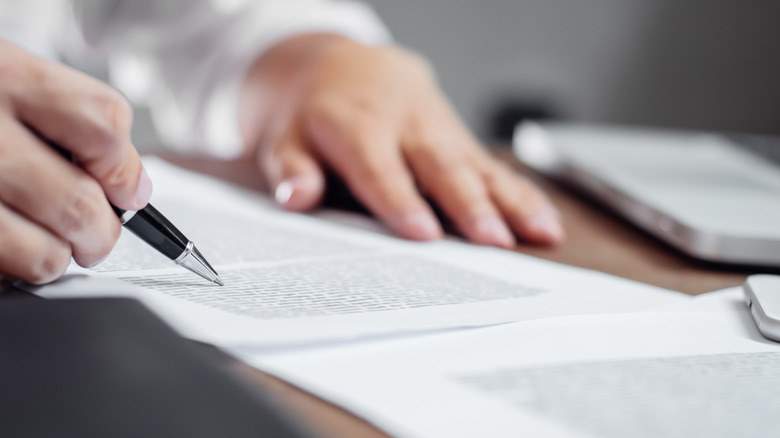 Person examining documents