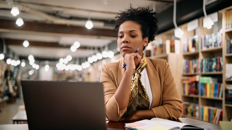 Woman doing research on her laptop