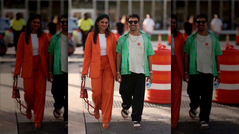 Couple wearing slide sandals