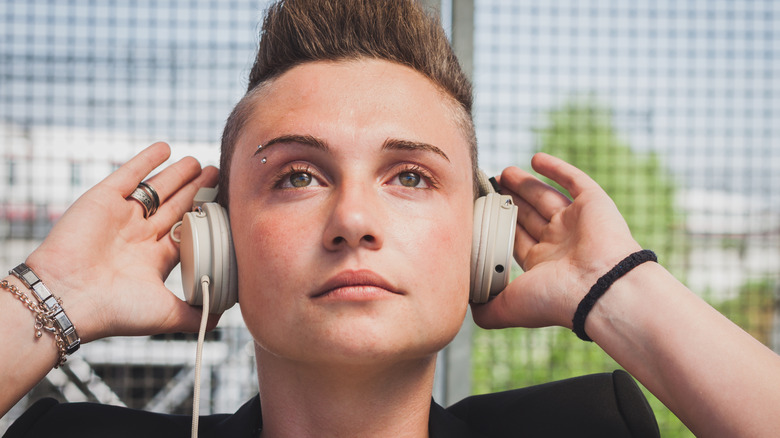 Person with eyebrow piercing