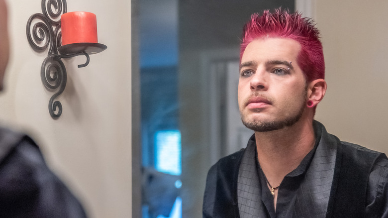 Man looking in the mirror