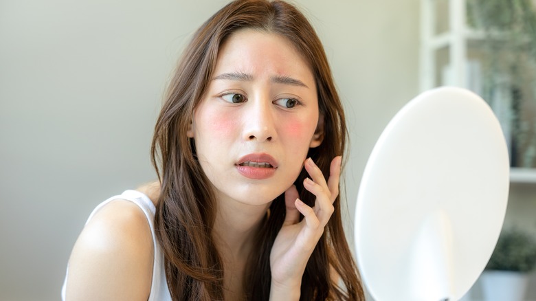 A woman with irritated skin