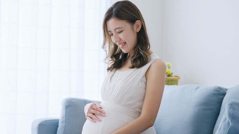 A smiling pregnant woman