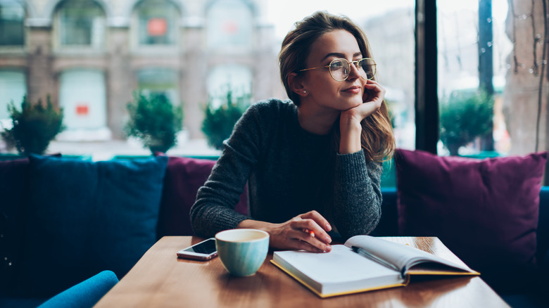woman writing her vows 