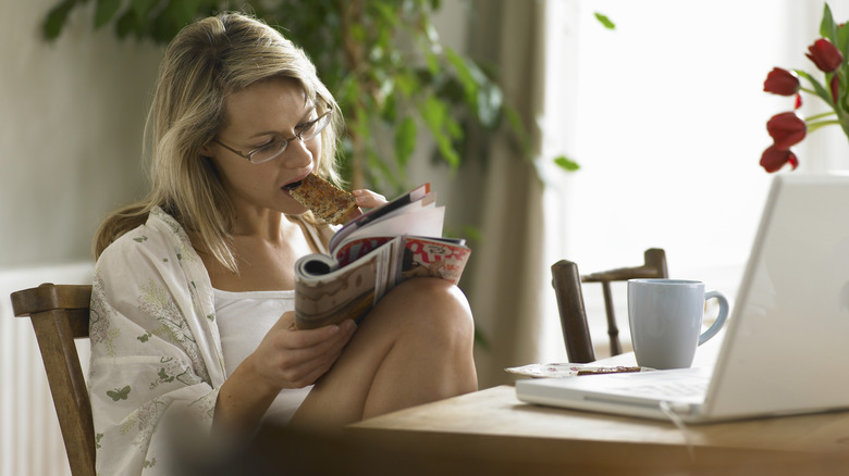 woman reading magazine