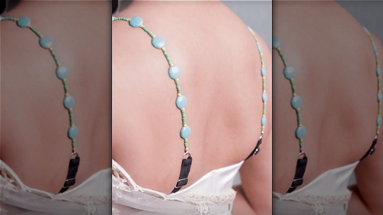 Woman with gem bra strap