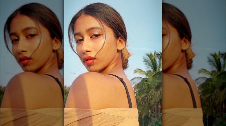 Woman with exposed bra strap