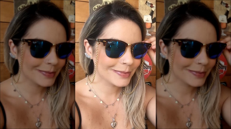 woman wearing eyeglasses with chain