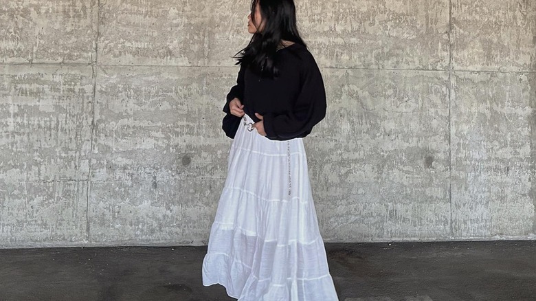 Sweater over a skirt