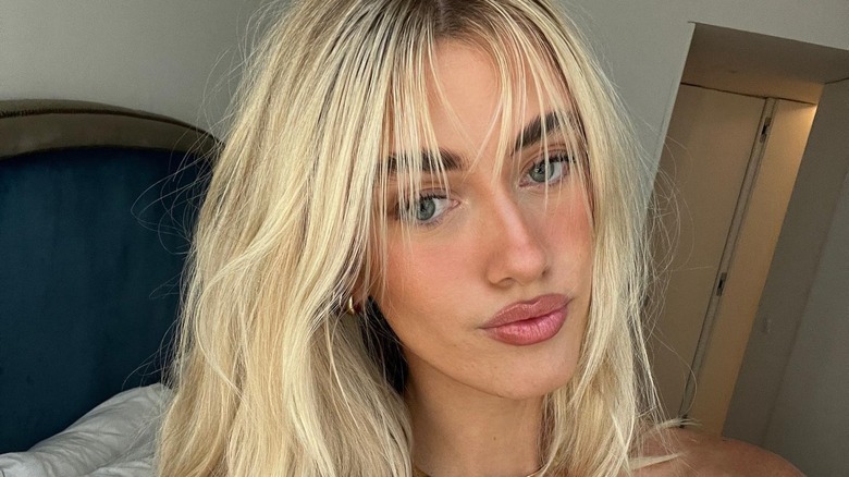 woman with wispy bangs