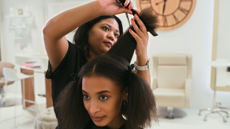 Woman getting a haircut