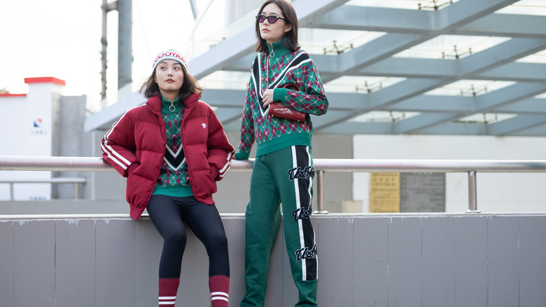 Two women wearing coordinating activewear