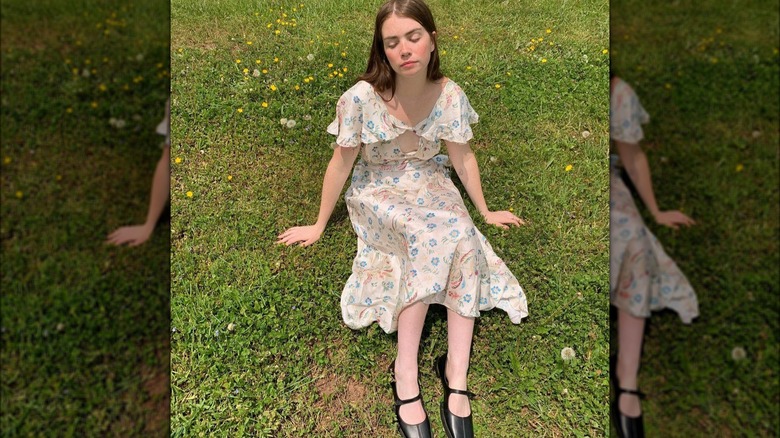 Woman wearing beige floral dress