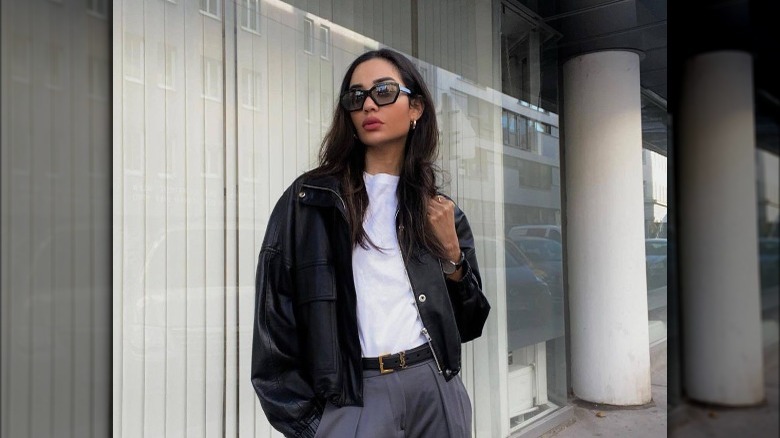 white tee under black leather jacket