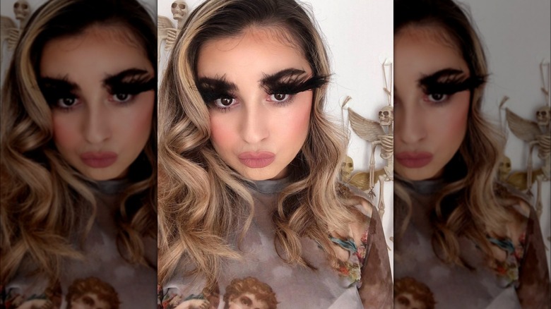 Long, black feather lashes