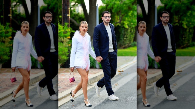 Sophia Richie in feather-trimmed blazer, shorts