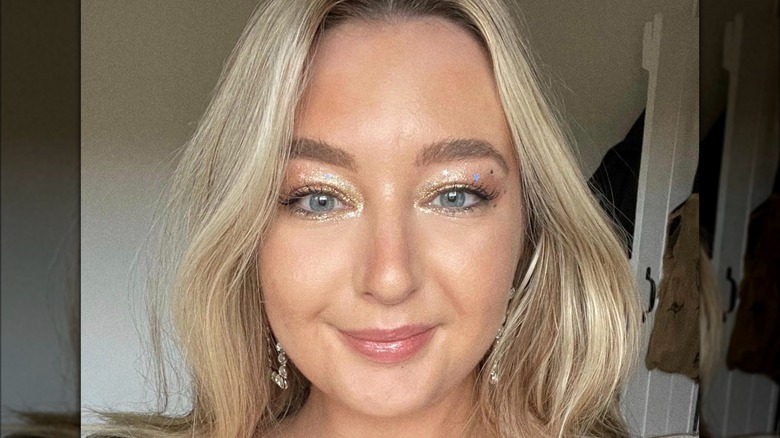 A woman with sparkly eyeshadow