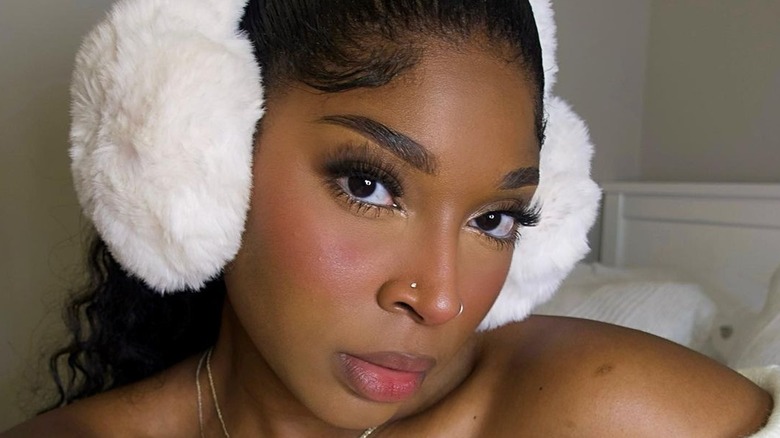 A woman with cold girl makeup