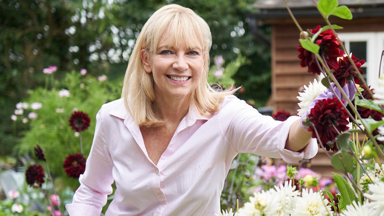 Older model gardening outside