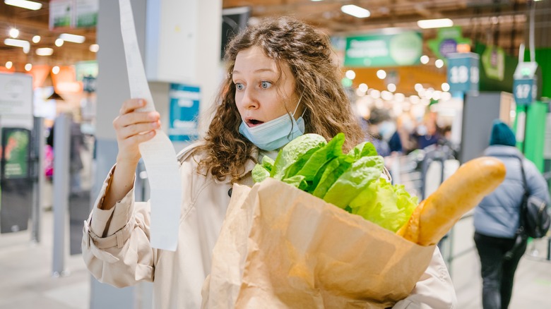 Woman shocked at grocery receipt 