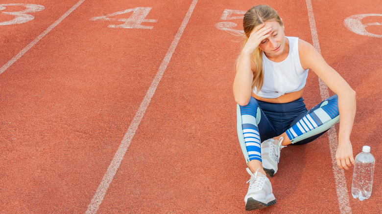 sad female runner after race