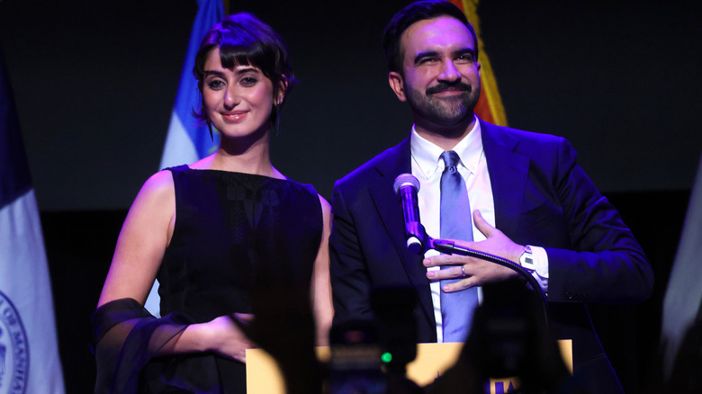 Rama Duwaji standing beside Zohran as he speaks during election night watch party